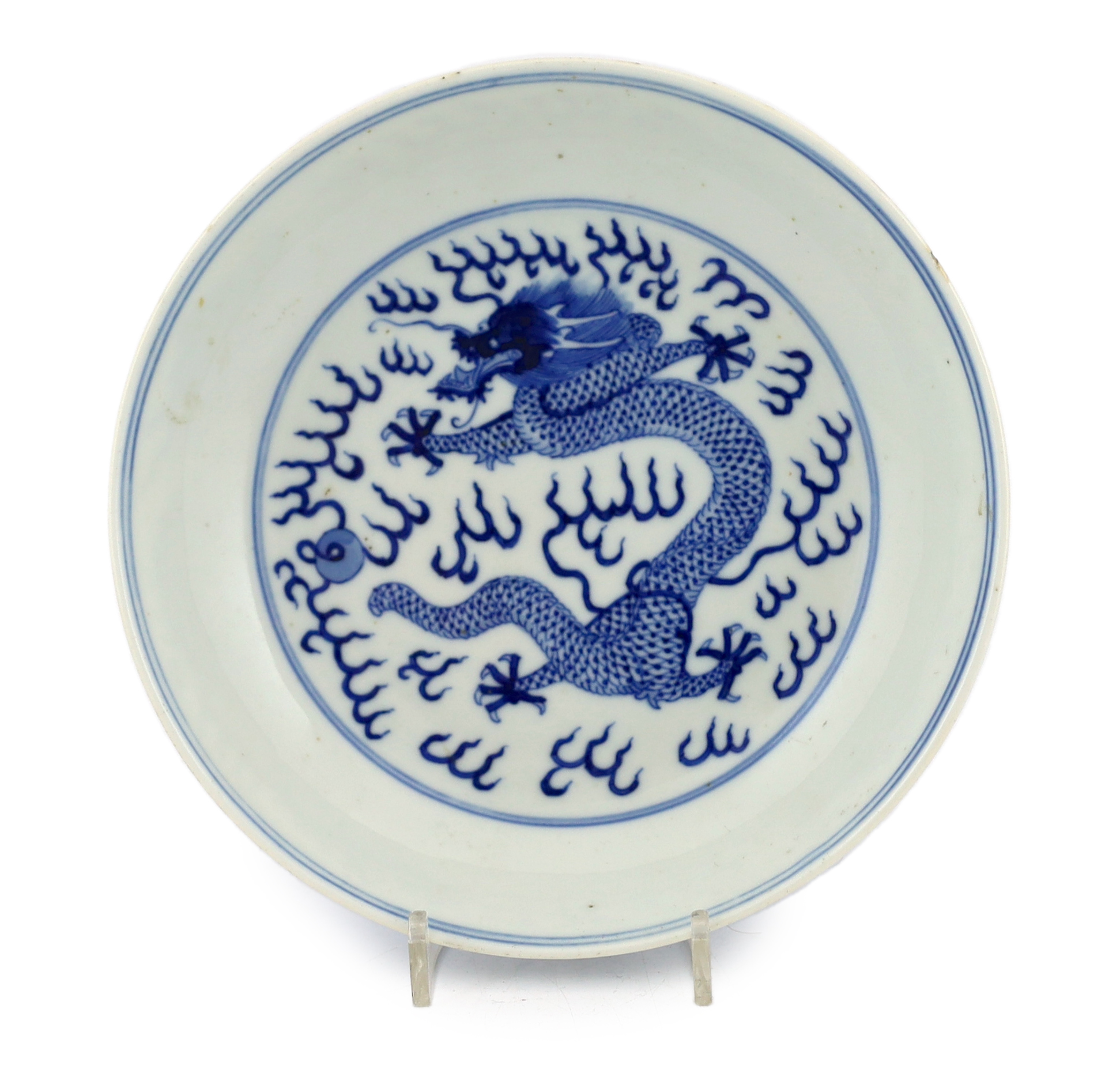 A Chinese blue and white ‘dragon’ dish, Guangxu mark and of the period (1875-1908), tiny glaze chip to rim